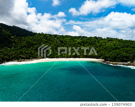 Aerial flying drone view seashore waves water surface texture in sunny tropical ocean at Phuket island Thailand 139074903