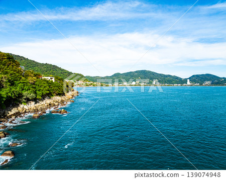 Aerial flying drone view seashore waves water surface texture in sunny tropical ocean at Phuket island Thailand Aerial flying drone view seashore waves water surface texture in sunny tropical ocean at Phuket island Thailand 139074948