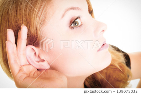 woman blonde buisnesswoman listening on white 139075032