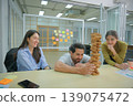 Business people and colleagues are working in the office. 139075472