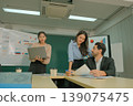 Business people and colleagues are working in the office. 139075475