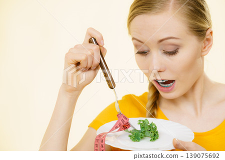 Shocked young woman being on diet 139075692