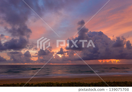 Aerial view of Pastel Skies and Gentle Waves at Dusk Aerial view of Pastel Skies and Gentle Waves at Dusk 139075708