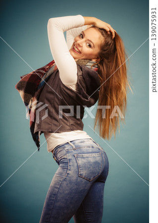 Positive girl in autumn season clothing Positive girl in autumn season clothing 139075931