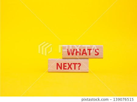 What is next symbol. Concept words What is next on wooden blocks. Beautiful yellow background. Business and What is next concept. Copy space. What is next symbol. Concept words What is next on wooden blocks. Beautiful yellow background. Business and What is next concept. Copy space. 139076515