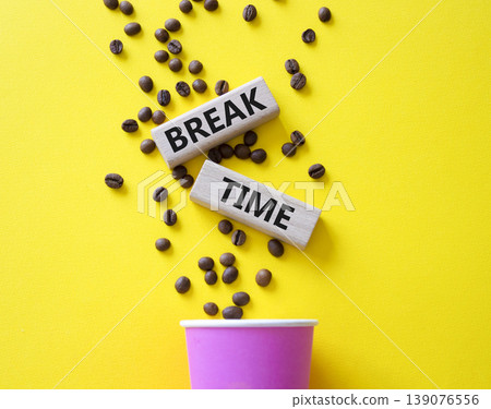 Break Time symbol. Concept words Break Time on beautiful wooden picture frame. Beautiful yellow background with coffee cup and coffee beans. Business and Break Time concept. Copy space. Break Time symbol. Concept words Break Time on beautiful wooden picture frame. Beautiful yellow background with coffee cup and coffee beans. Business and Break Time concept. Copy space. 139076556