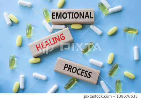 Emotional Healing Process symbol. Concept words Emotional Healing Process on wooden blocks. Beautiful blue background with pills. Healthcare and Emotional Healing Process concept. Copy space. Emotional Healing Process symbol. Concept words Emotional Healing Process on wooden blocks. Beautiful blue background with pills. Healthcare and Emotional Healing Process concept. Copy space. 139076635