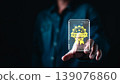 Businessman touching a virtual quality assurance badge on digital interface, symbolizing standard certification, high performance, and product guarantee in modern technology industry. 139076860