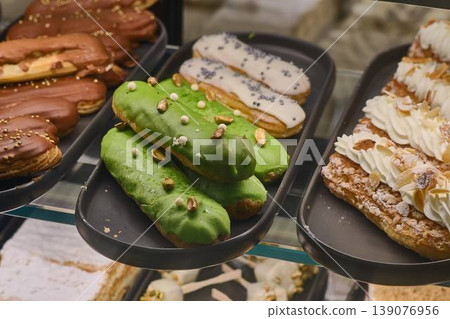 Variety of colorful cakes and sweet desserts Variety of colorful cakes and sweet desserts 139076956
