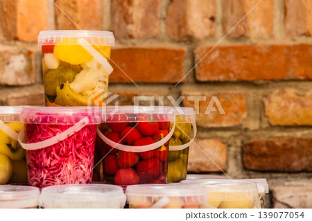 Jars with pickled vegetables in cellar Jars with pickled vegetables in cellar 139077054