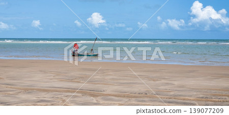 Fishermen at Canoa Quebrada Beach at Aracati in Ceara, Brazil. Bay Coastline Fishermen at Canoa Quebrada Beach at Aracati in Ceara, Brazil. Bay Coastline 139077209