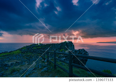 The breathtaking panoramic view of Cape Hedo, where the sky and sea unfold in a fantastical way before dawn. 139077333