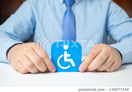 An official explains disability status. Social support and benefits include application and registration guidance. Government programs ensure access, protection and inclusion for vulnerable groups. An official explains disability status. Social support and benefits include application and registration guidance. Government programs ensure access, protection and inclusion for vulnerable groups. 139077348