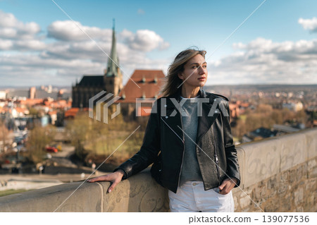 Woman Looking Away at Historic European Viewpoint Woman Looking Away at Historic European Viewpoint 139077536