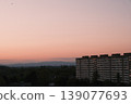 sunset over city 139077693
