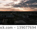 sunset with highly detailed aerial city view with crossroads 139077694