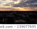 beautifull sunset view of the city through the clouds 139077695