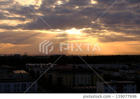 sunset over city sunset over city 139077696