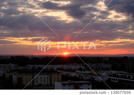 sunset over the city in Germany sunset over the city in Germany 139077698