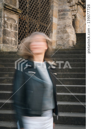 Abstract Blurred Portrait of Woman on Cathedral Steps Abstract Blurred Portrait of Woman on Cathedral Steps 139077726