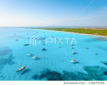 Aerial view of a boats floating on turquoise sea water. Serene summer vacation concept 139078294