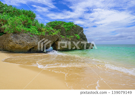 The emerald sea and rocky reefs create a stunning beach in Ishigaki Island. The emerald sea and rocky reefs create a stunning beach in Ishigaki Island. 139079149