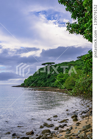 Ishigaki Island's Osaki Beach is enveloped in tranquility under the rainy season sky. Ishigaki Island's Osaki Beach is enveloped in tranquility under the rainy season sky. 139079152