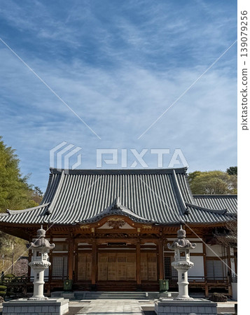 The main hall of Dounji Temple in Sendai, with its striking symmetrical composition, and the scenery of traditional Japanese architecture. The main hall of Dounji Temple in Sendai, with its striking symmetrical composition, and the scenery of traditional Japanese architecture. 139079256