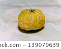 A giant lion-shaped yuzu (oni-yuzu) placed on the table. 139079639