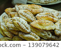 A mountain of Genovese di Erice, Erice's famous pastry. 139079642