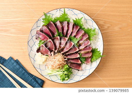 Straw-grilled bonito served on a large plate Straw-grilled bonito served on a large plate 139079985