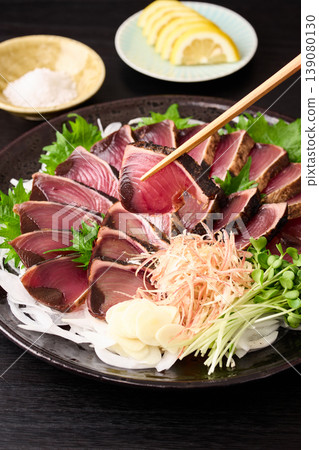 Straw-grilled bonito served on a large plate 139080130