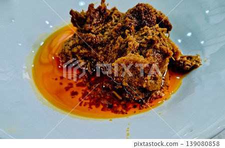 close-up photo of delicious traditional Indonesian food, beef rendang close-up photo of delicious traditional Indonesian food, beef rendang 139080858