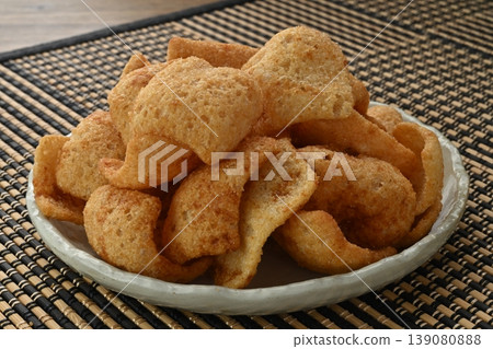 Fried onion rice crackers Fried onion rice crackers 139080888
