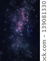 The Galaxy is covered with a violet-blue atmosphere and the clouds are spinning. 139081330