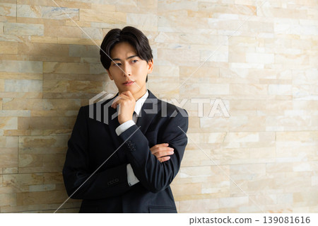 Businessman with arms folded 139081616