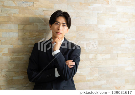 Businessman with arms folded 139081617