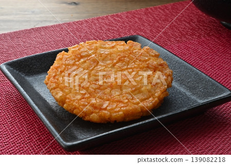 Large fried rice crackers with spicy cod roe filling. Large fried rice crackers with spicy cod roe filling. 139082218