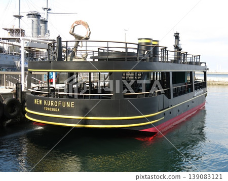The "NEW KUROFUNE" ferry to Sarushima Island awaits departure at Mikasa Pier in Yokosuka City. The "NEW KUROFUNE" ferry to Sarushima Island awaits departure at Mikasa Pier in Yokosuka City. 139083121