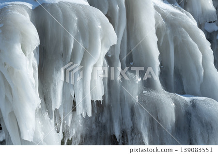 Icicles on the rocks 139083551
