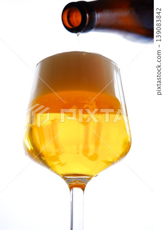 Beer - Pour a cold beer into a glass Beer - Pour a cold beer into a glass 139083842
