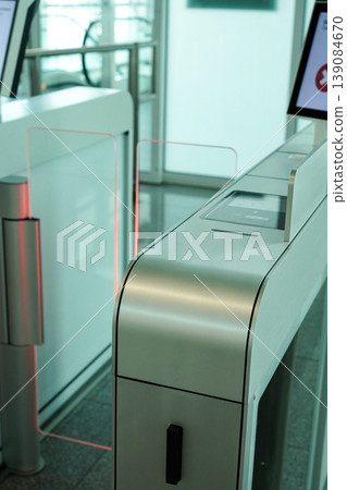 E-gate (automated gate) located at the airport boarding gate. E-gate (automated gate) located at the airport boarding gate. 139084670
