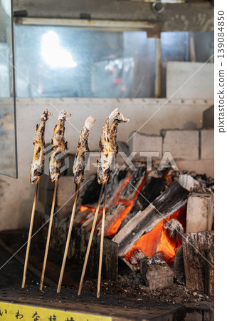 Salt-grilled fish cooked over charcoal 139084850
