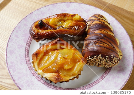 Apple pie, chocolate cornet, sweet bread Apple pie, chocolate cornet, sweet bread 139085170