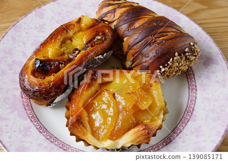 Apple pie, chocolate cornet, sweet bread Apple pie, chocolate cornet, sweet bread 139085171