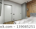 Closed Bifold Door in Modern Grey Bedroom Interior 139085251