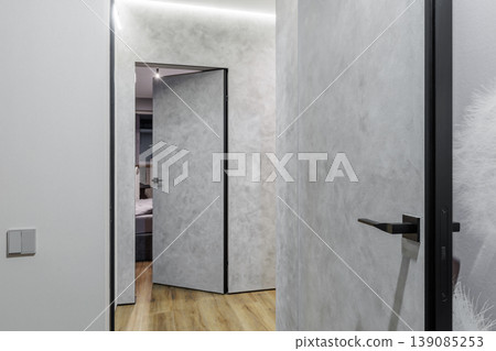 Modern Interior with Invisible Flush Doors and Concrete Texture Modern Interior with Invisible Flush Doors and Concrete Texture 139085253