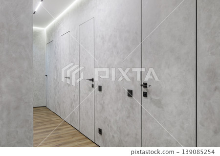 Perspective of Minimalist Hallway with Hidden Flush Doors Perspective of Minimalist Hallway with Hidden Flush Doors 139085254