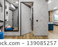 Modern Entrance Hall with Open Flush Door and Mirror 139085257