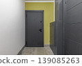 Modern Apartment Entrance with Dark Textured Security Door 139085263